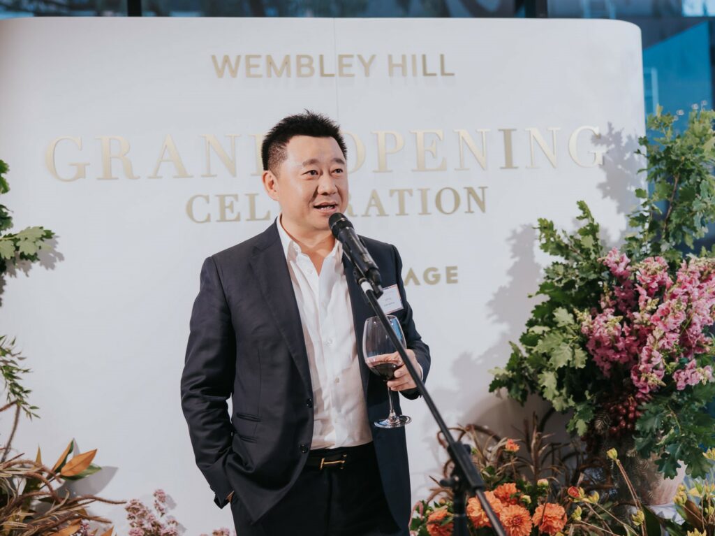 speech being given at wembley hill opening